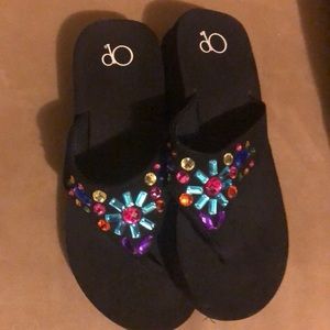 Size 2 like new flip flops with jewels